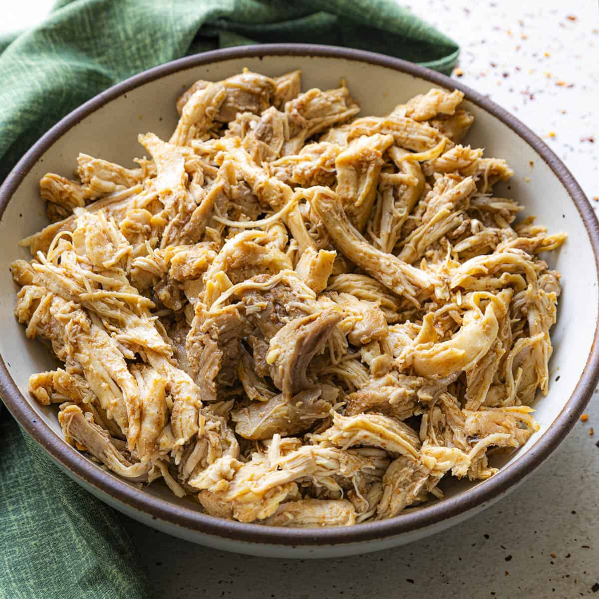 Easy Shredded Chicken Recipe (Stovetop or Slow Cooker) - Chili Pepper ...