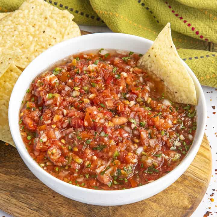 Homemade Salsa in a serving bowl with tortilla chips