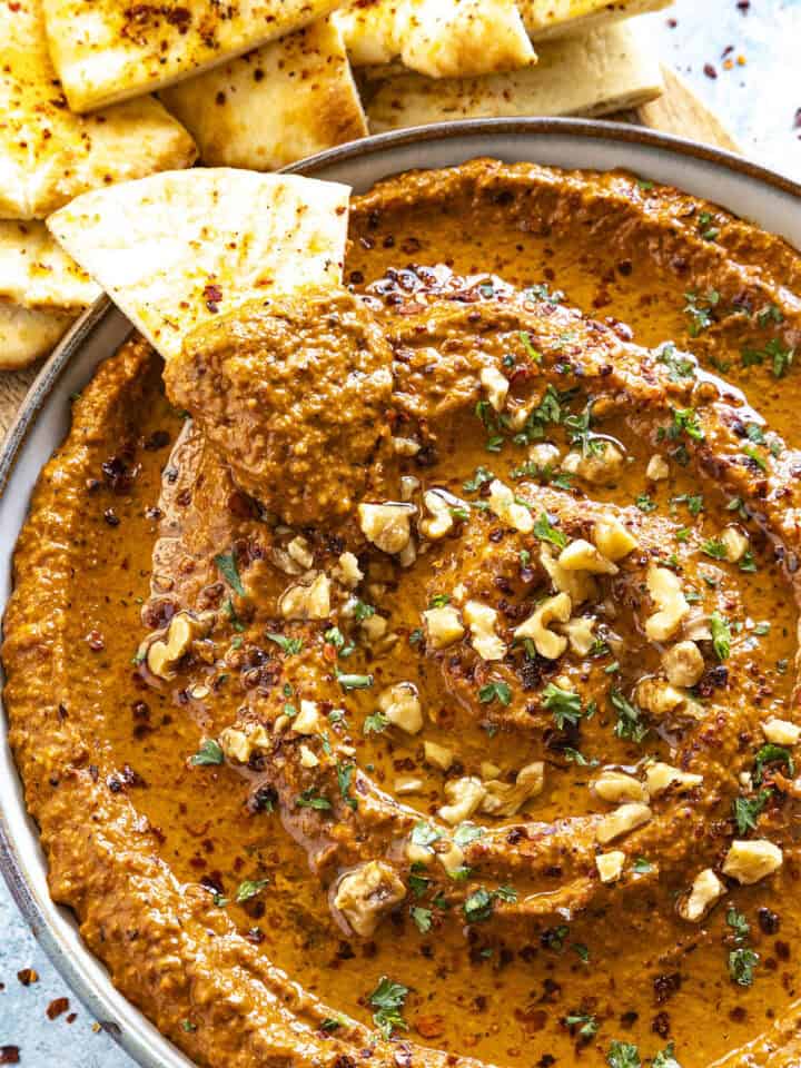 Muhammara Dip in a bowl with pita