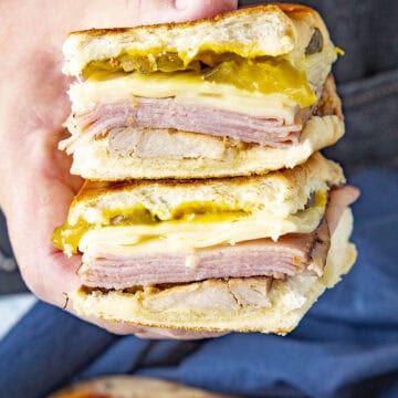 Mike holding a Cuban Medianoche Sandwich