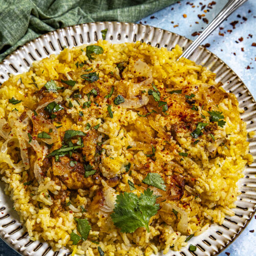A hearty helping of Chicken Biryani on a serving plate
