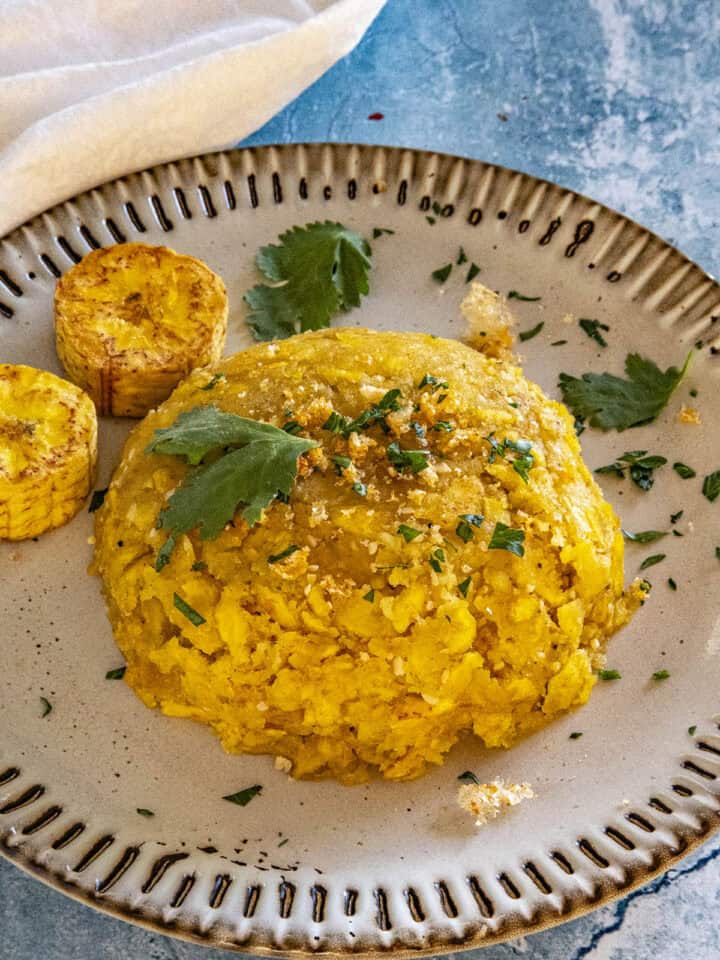 Mofongo on a plate with garnish