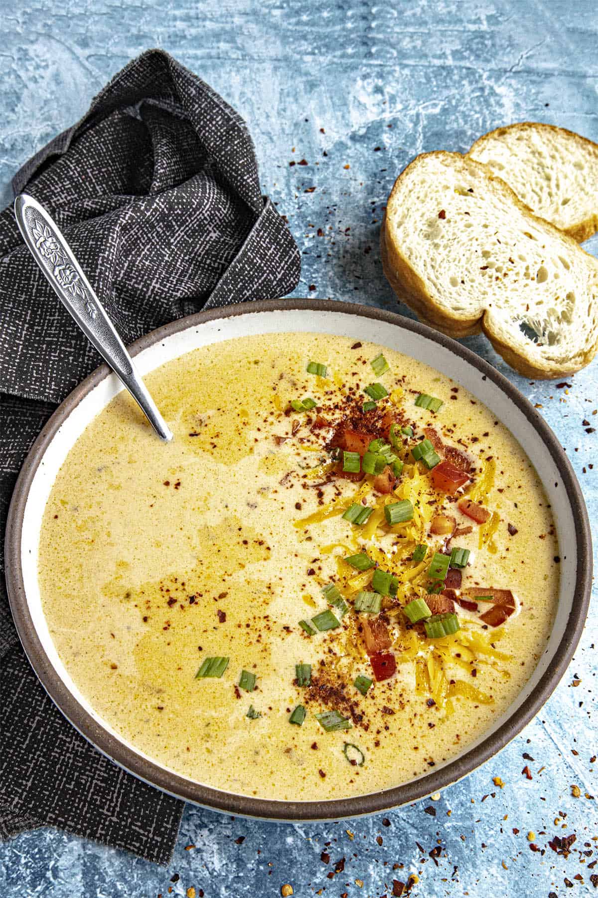 Beer Cheese Soup in a bowl with garnish
