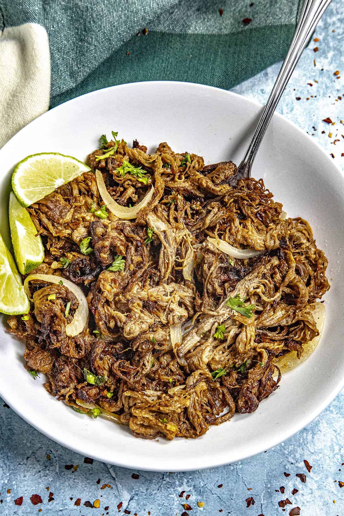 Cuban fried beef (Vaca Frita) in a bowl with lots of fried onions