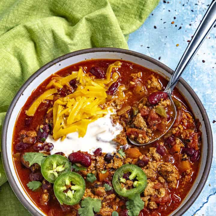 A delicious bowl of Turkey Chili with garnish