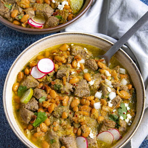 Carne en su Jugo served in a bowl with garnish