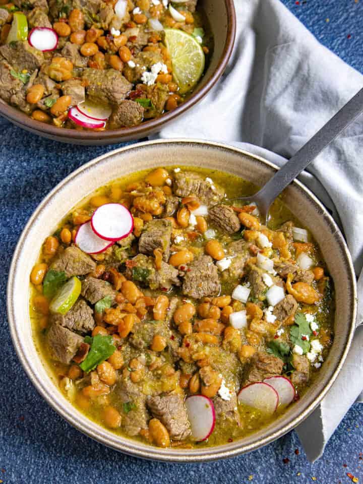 Carne en su Jugo served in a bowl with garnish