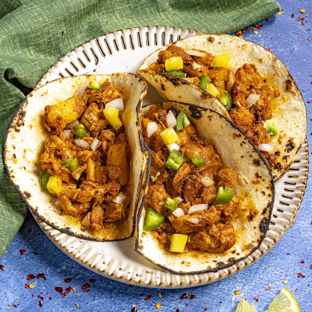 Chicken al pastor tacos on a plate