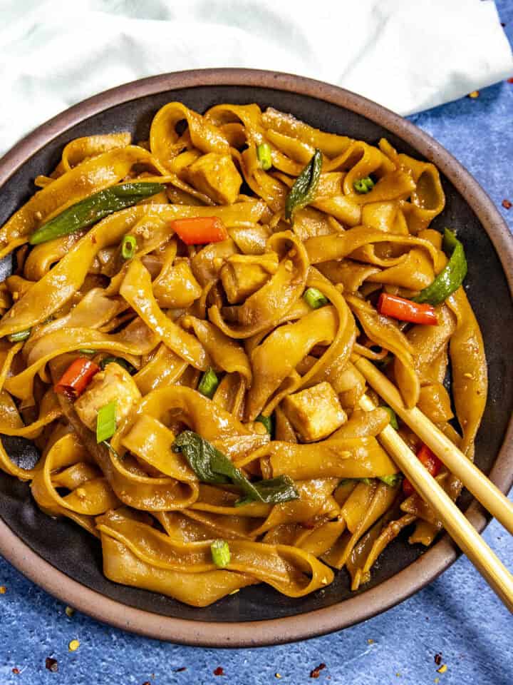 Saucy Drunken Noodles on a plate, ready to serve