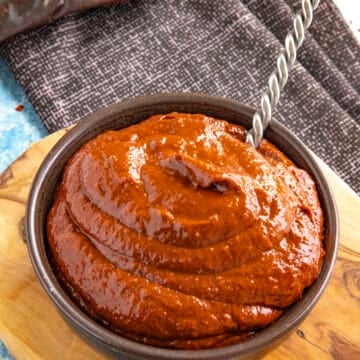 Harissa Paste in a bowl with a spoon