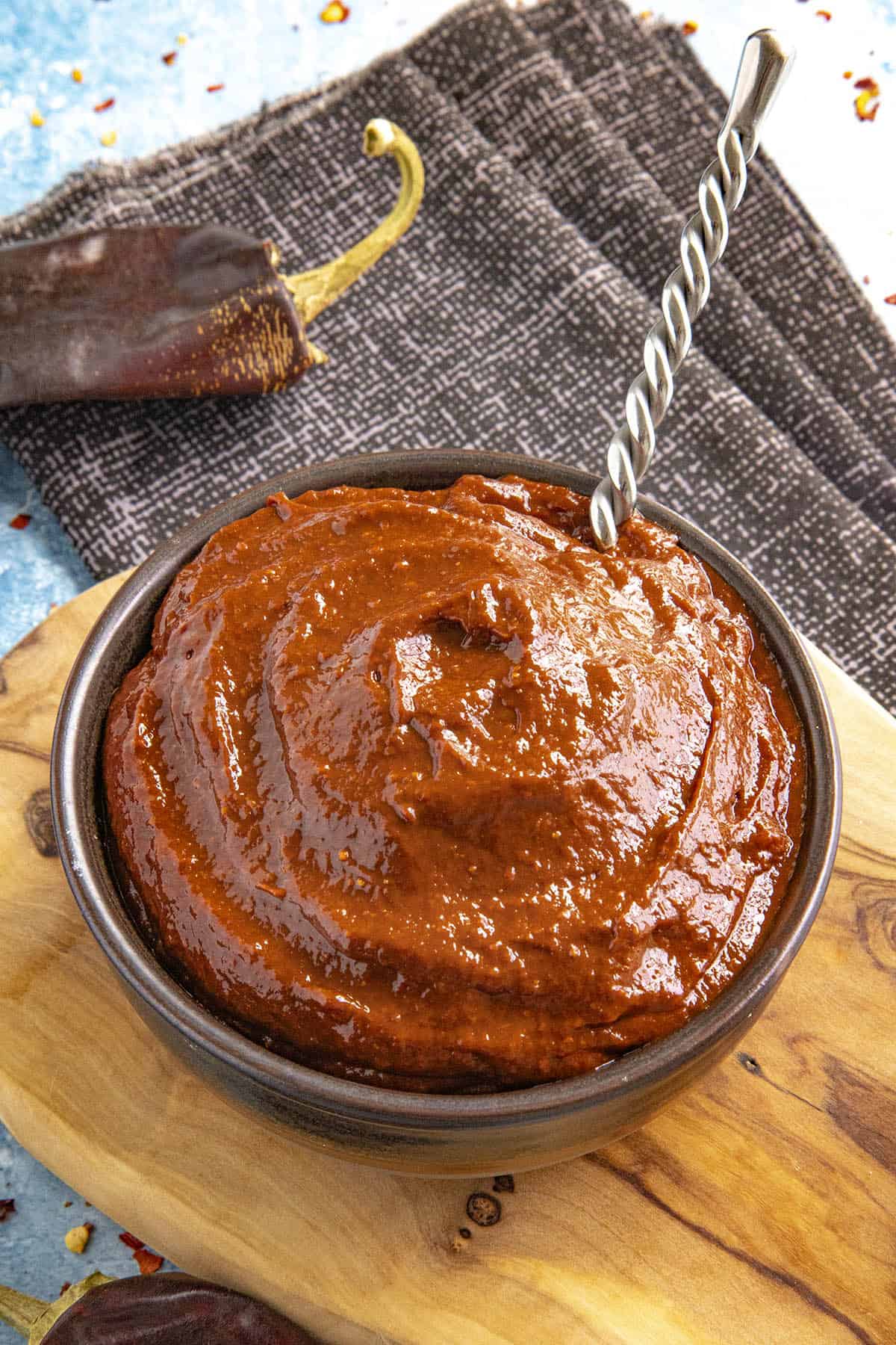 Harissa Paste in a bowl with a spoon