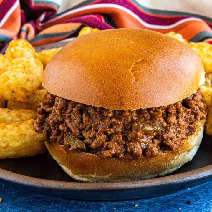 A Homemade Sloppy Joe Recipe with tater tots on a plate