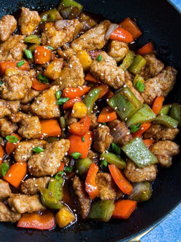 Sweet and Sour Pork in a wok, ready to serve