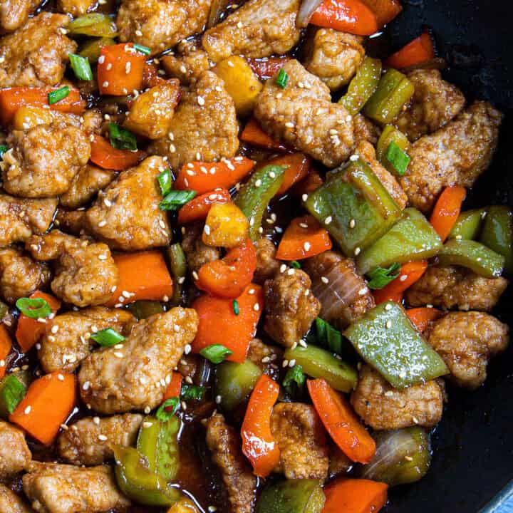 Sweet and Sour Pork in a wok, ready to serve