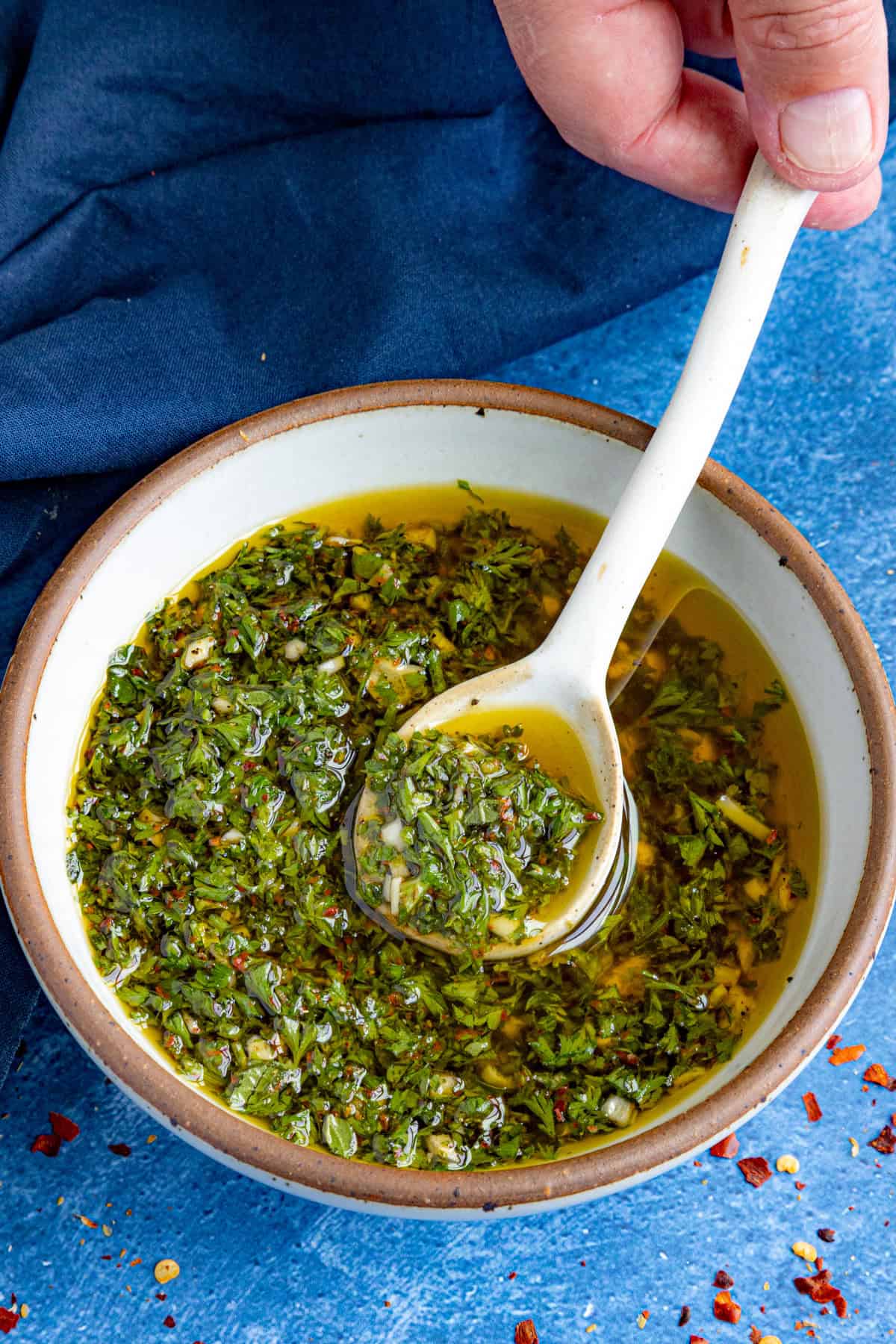 Serving a spoonful of Chimichurri sauce