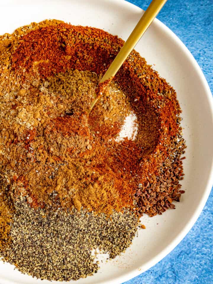 Mixing Baharat Spice Blend ingredients on a plate
