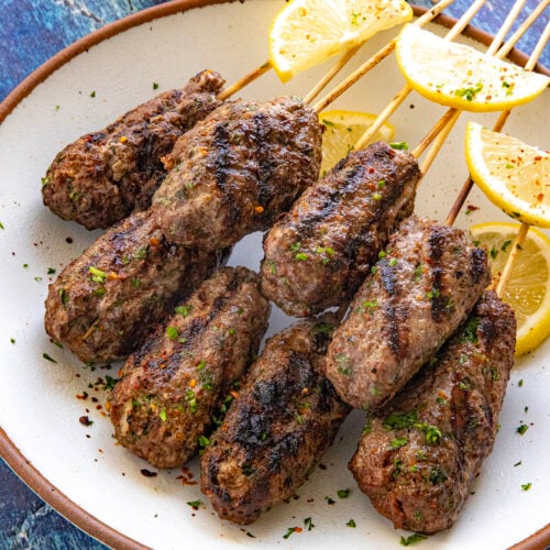 Kofta Kebabs served with lemon wedges