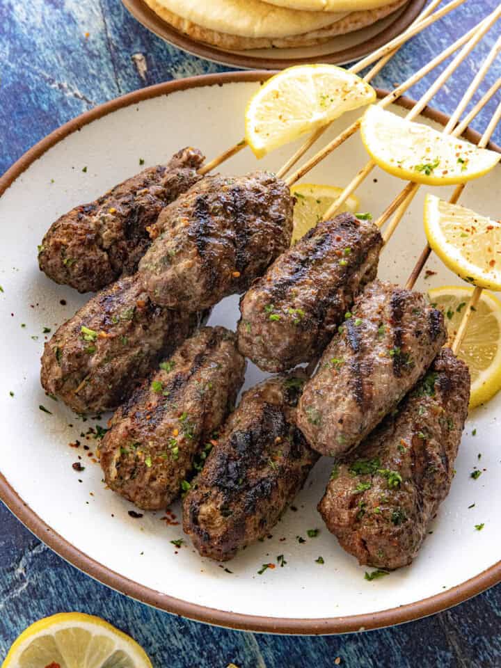 Kofta Kebabs served with lemon wedges