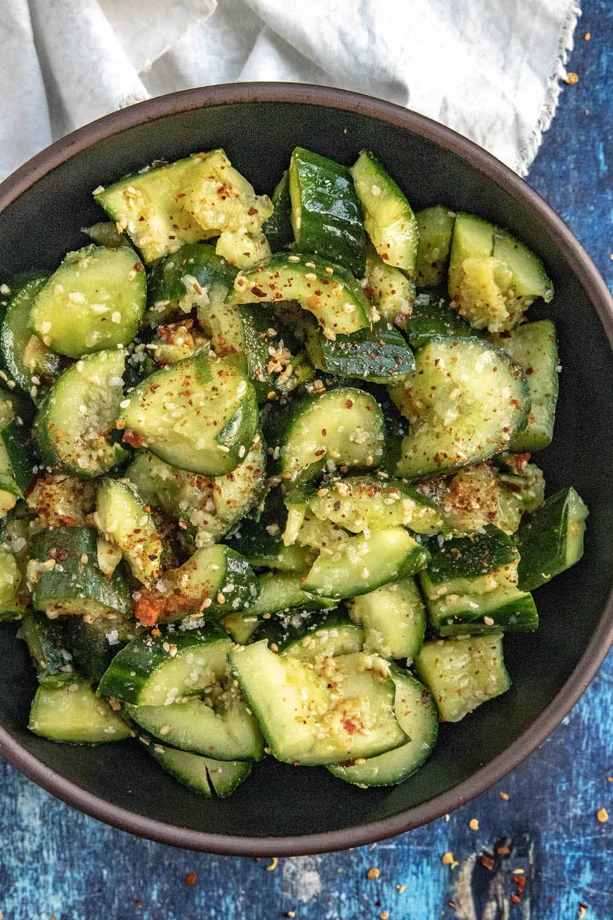 Serving a large bowl of Asian Cucumber Salad