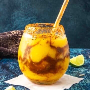 A glass filled with Sweet and delicious Mangonada Margarita