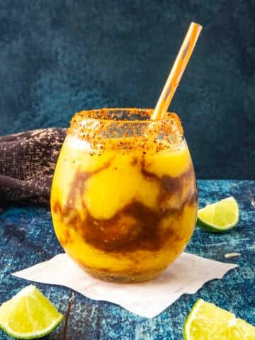 A glass filled with Sweet and delicious Mangonada Margarita