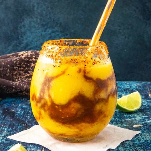 A glass filled with Sweet and delicious Mangonada Margarita