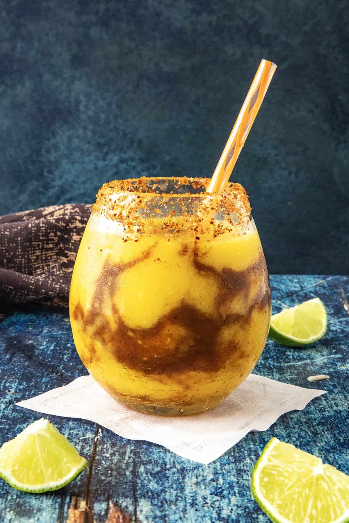 A glass filled with Sweet and delicious Mangonada Margarita