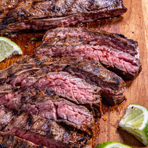 Grilled Arrachera (Mexican Skirt Steak) on a cutting board, ready to serve