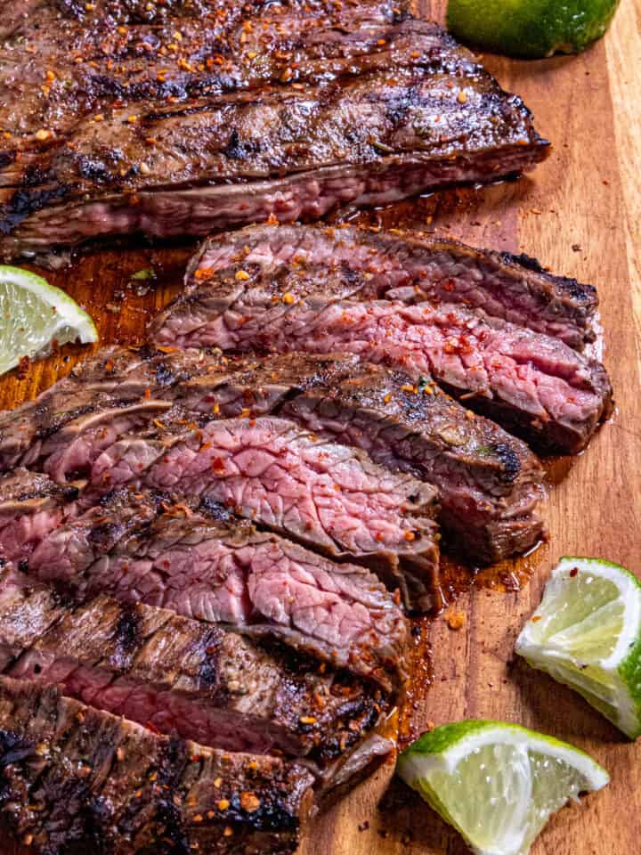 Grilled Arrachera (Mexican Skirt Steak) on a cutting board, ready to serve