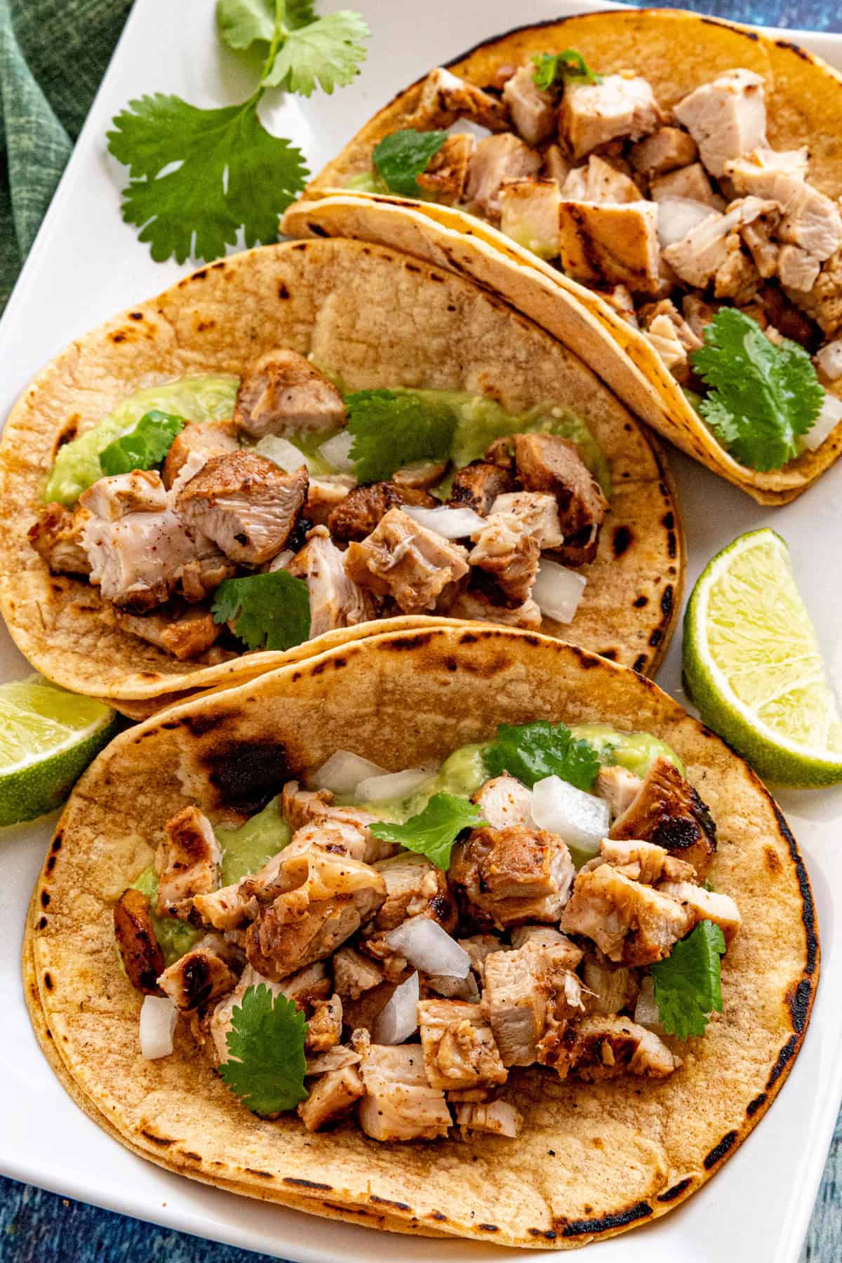 Juicy and moist street style chicken tacos served on corn tortillas