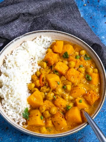 Thai-style Butternut Squash Curry served in a bowl over rice
