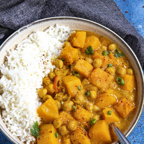 Thai-style Butternut Squash Curry served in a bowl over rice