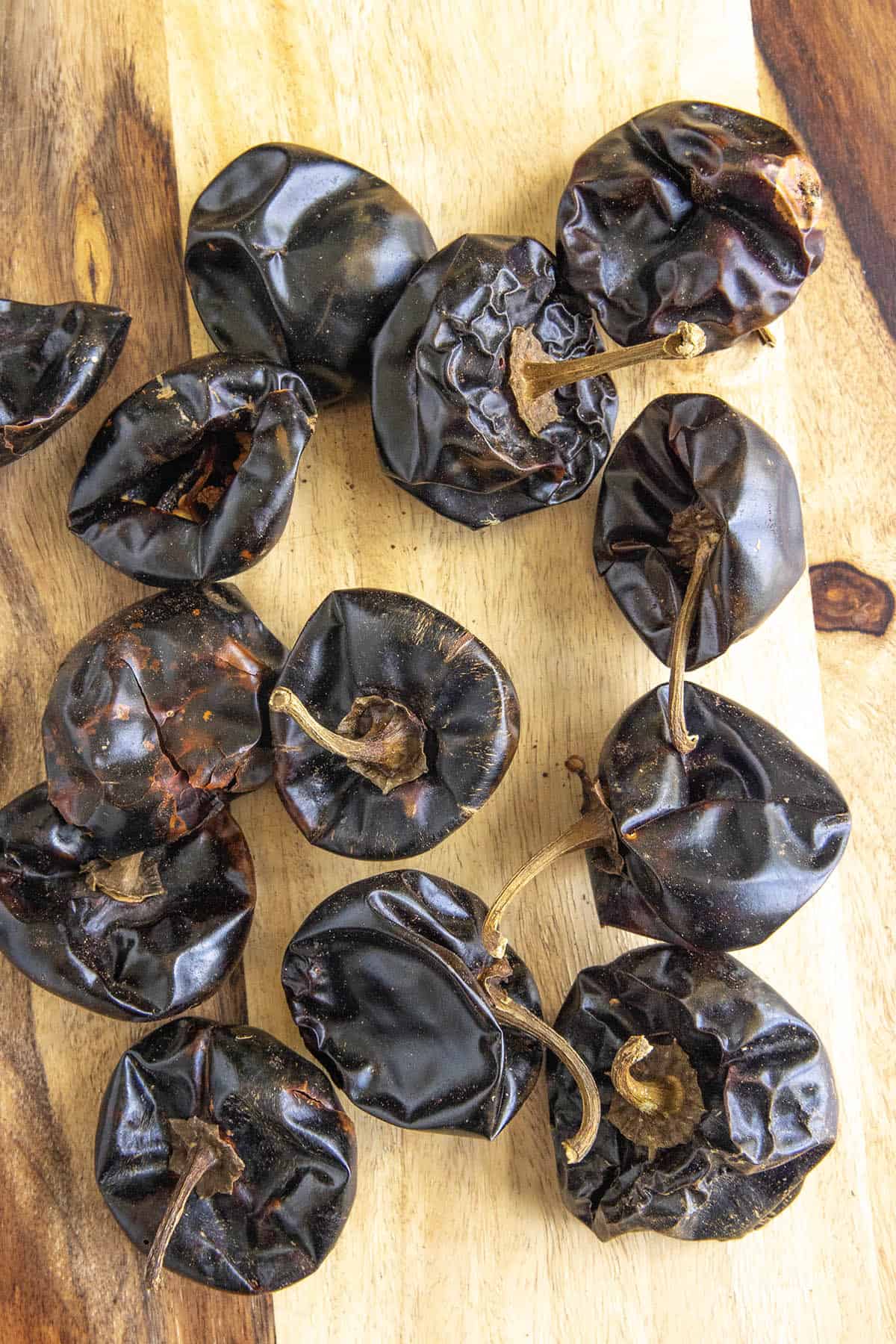A pile of Cascabel Pepper (Chile Cascabel) on a board