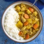 A bowl of hearty Japanese style curry with lots of potatoes and carrots