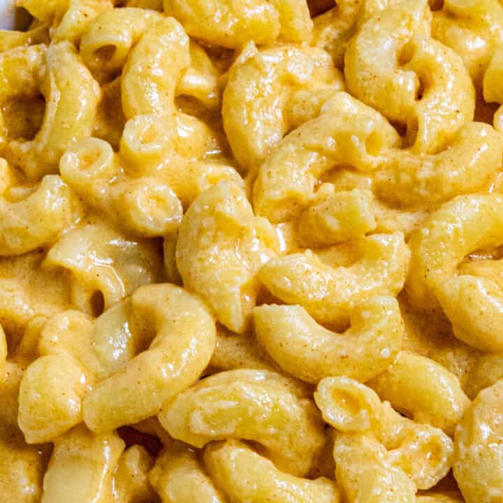 Close up of Creamy Macaroni and Cheese in a bowl to show how extra creamy and cheese you can make it