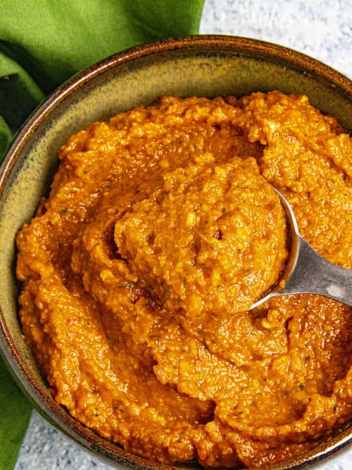 Spicy Thai Red Curry Paste in a bowl, ready for cooking Thai cuisine