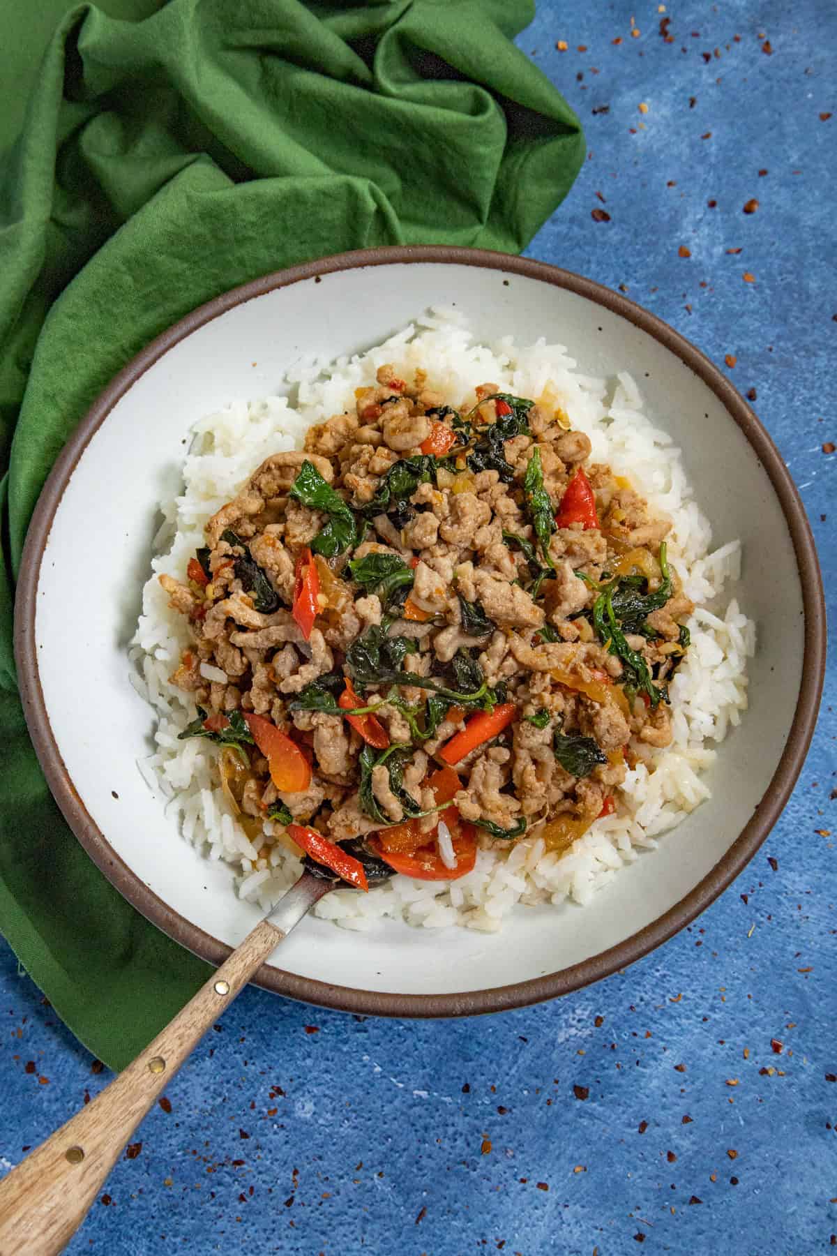 Thai holy basil stir fry (Pad Kra Pa) served in a bowl over rice