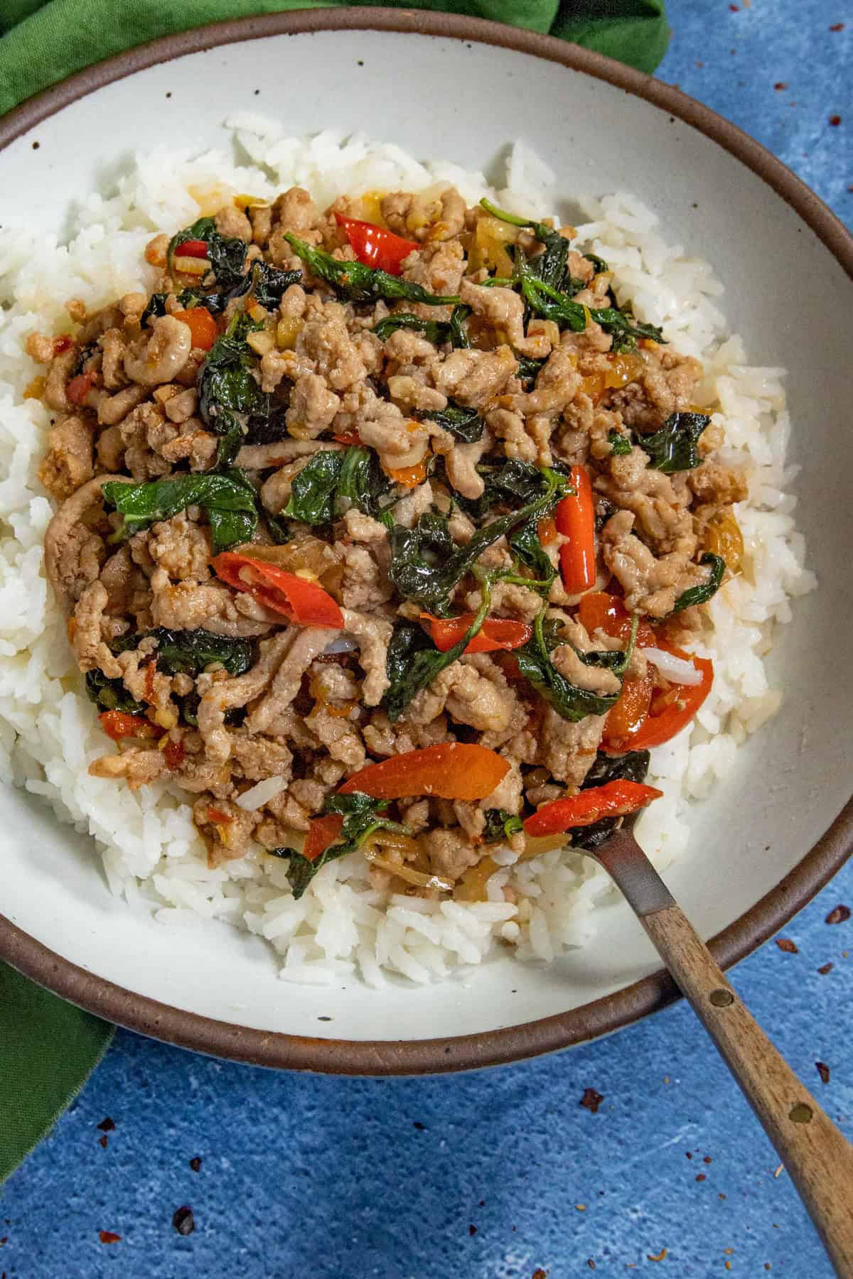 A bowl of spicy Pad Kra Pao (Thai Basil Stir Fry), ready for serving