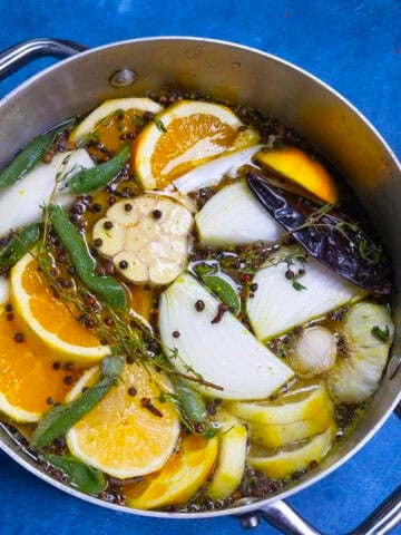 Turkey brine ingredients in a large pot, ready to brine the turkey