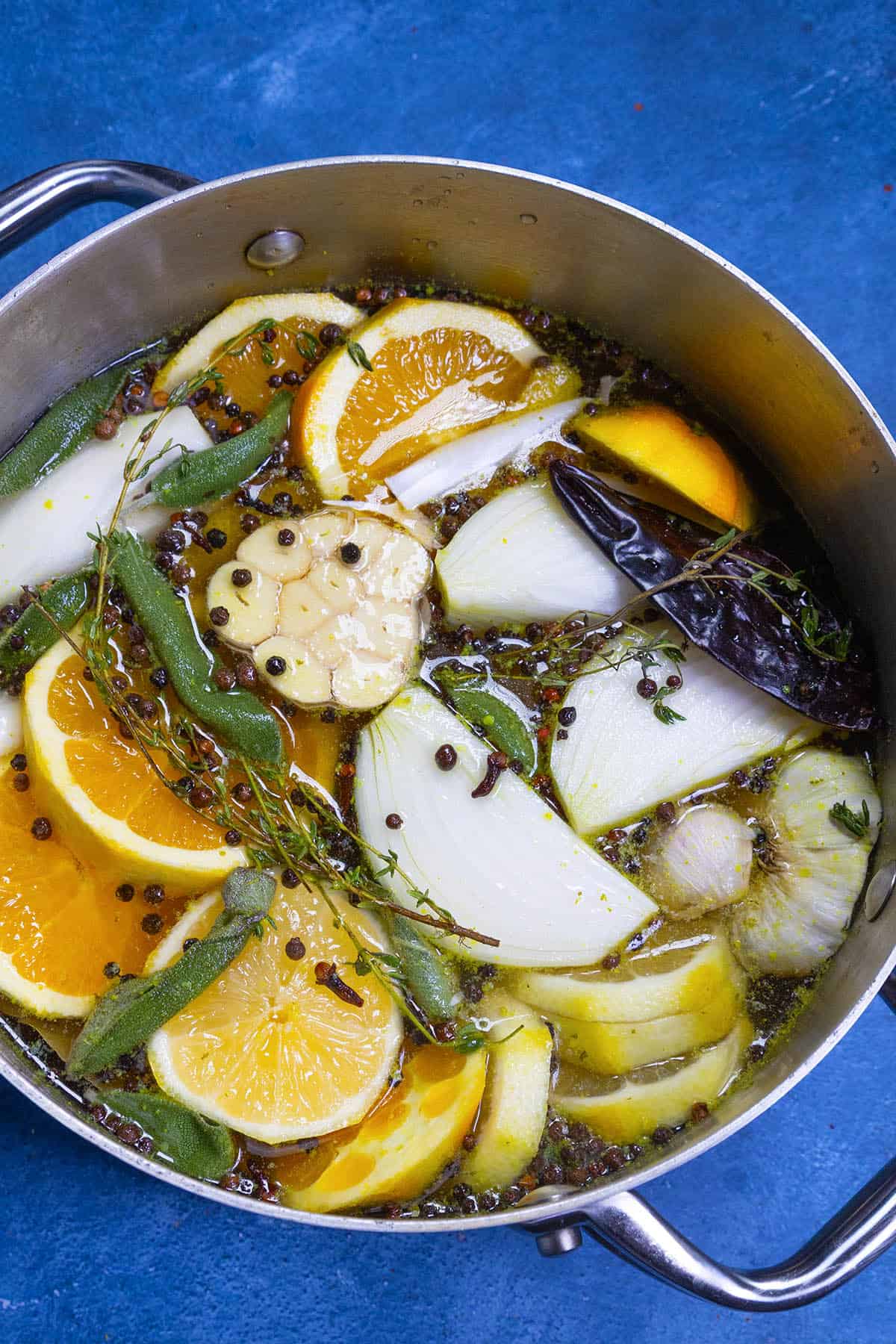 Turkey brine ingredients in a large pot, ready to brine the turkey