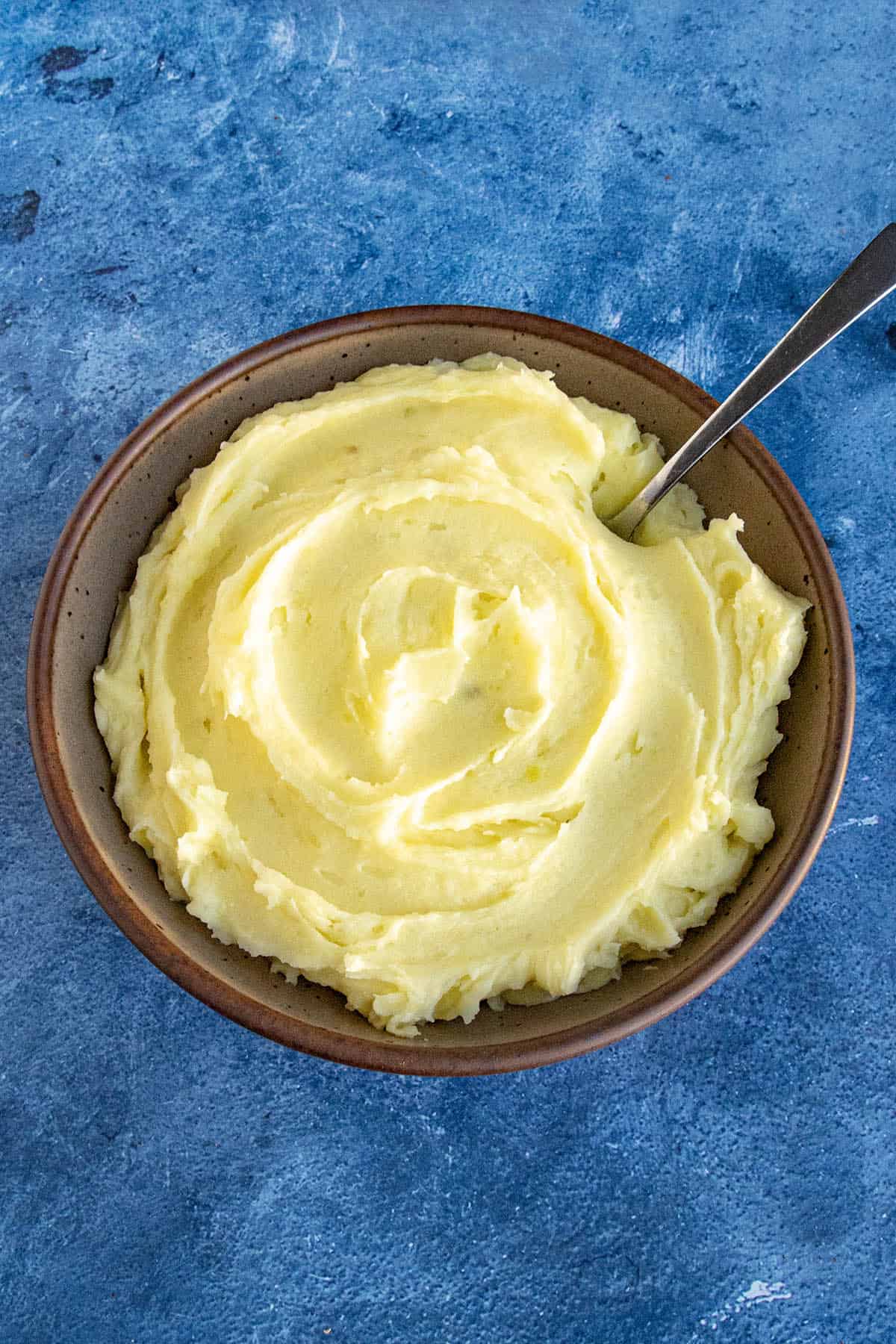 Mashed potatoes in a bowl for making Shepherds Pie