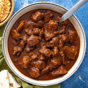 A bowl of chunky, saucy Asado de Puerco (Mexican Pork Stew)