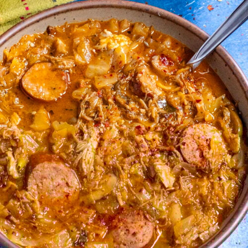 Polish Hunter's Stew (Bigos) served in a bowl with a spoon