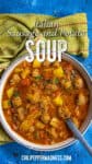 Hearty Italian Sausage and Potato Soup in a large bowl with a spoon