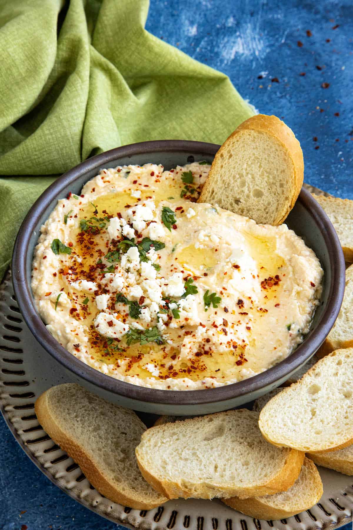 Tirokafteri (Greek Spicy Feta Dip) in a bowl with toasted bread