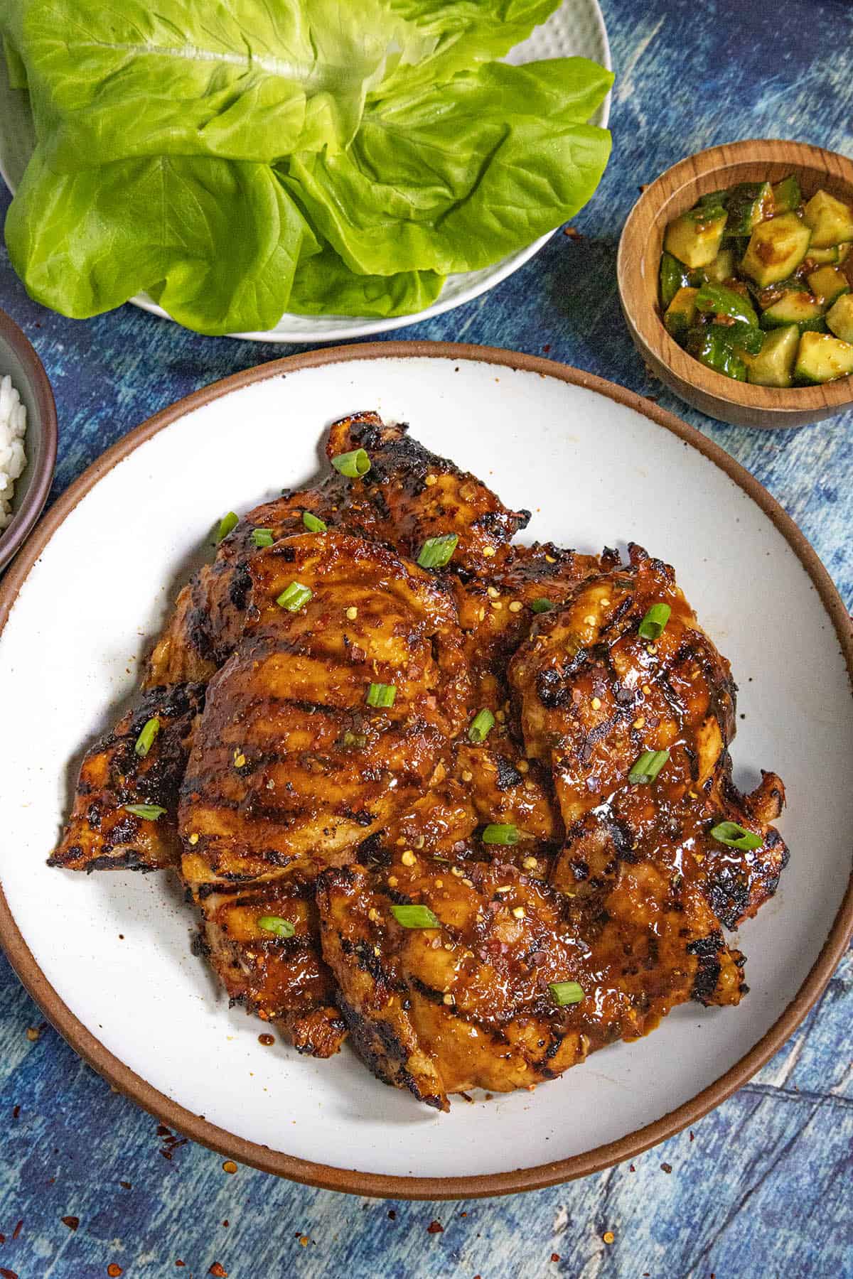 Freshly grilled Korean BBQ Bulgogi chicken served on a white platter