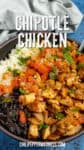 A bowl of chipotle chicken in a bowl over rice, with black beans and salsa