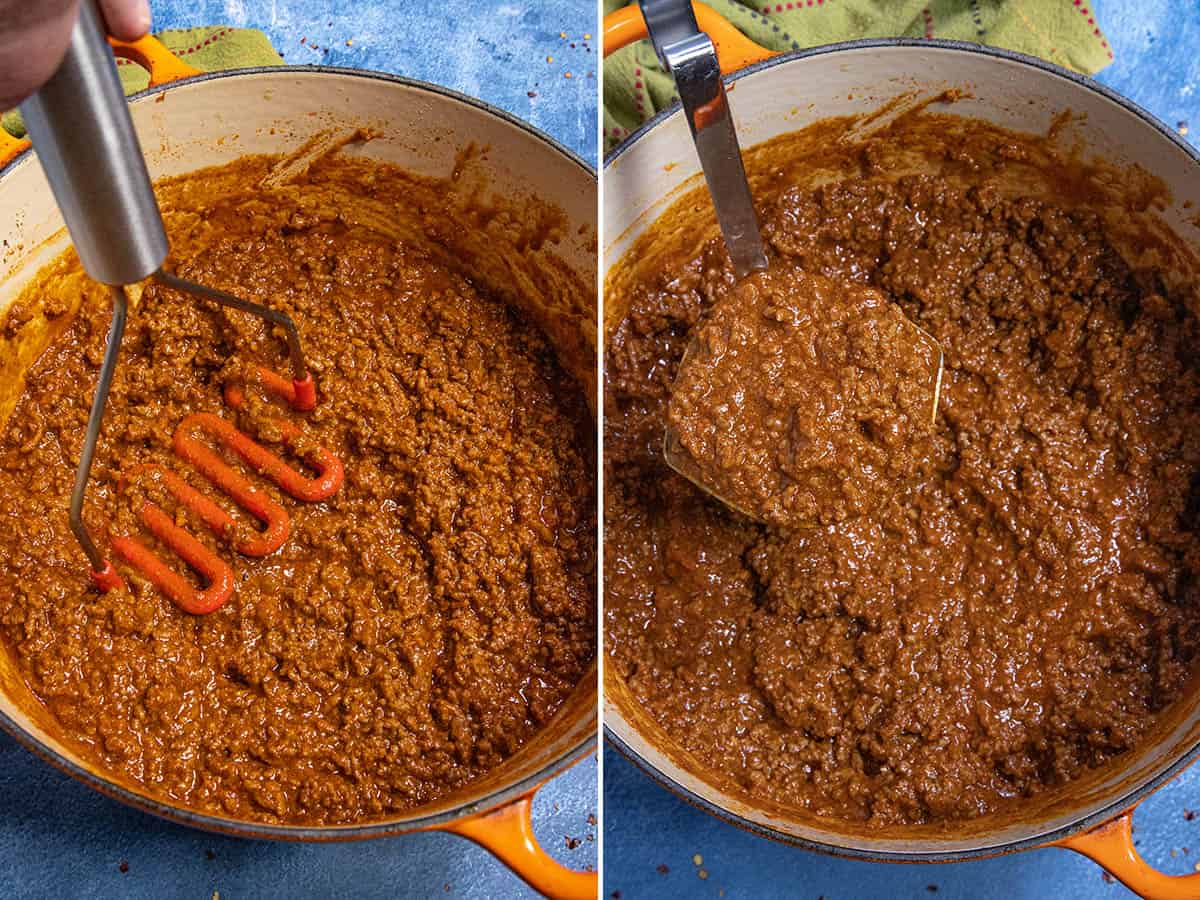 Mashing chili in a pot to make it thicker and more scoopable for topping hot dogs