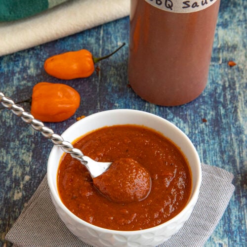 Spicy habanero honey bbq sauce served in a bowl, and in a squeeze bottle