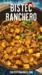 A pot filled with hearty Bistec Ranchero con Papas stew, garnished with fresh cilantro on top, set against a blue textured background.